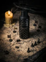 Maison Asrar Vanguard perfume with minimal apple and cedarwood arranged strictly behind the bottle.