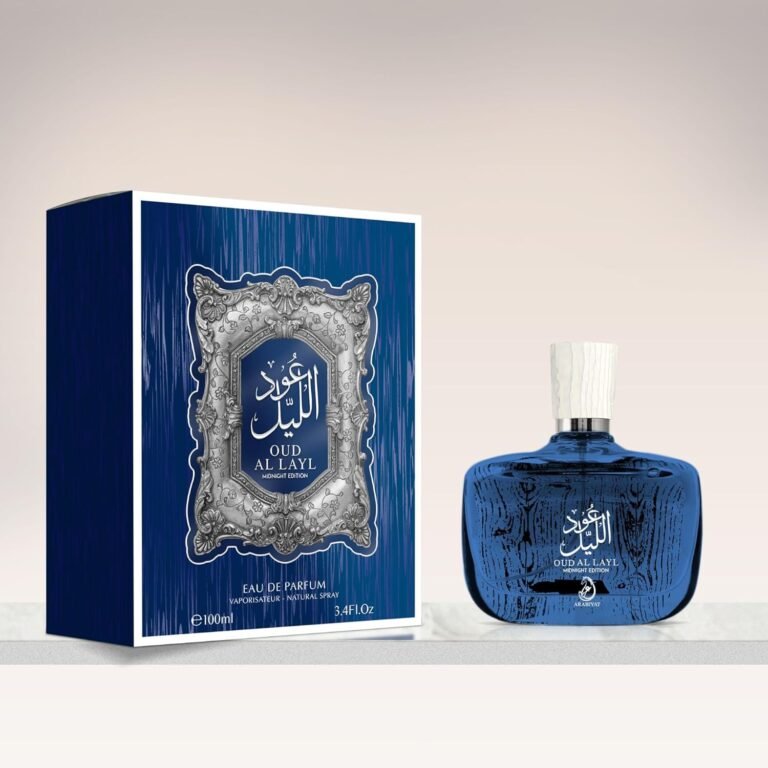 Arabiyat Prestige Oud Al Layl Midnight perfume with minimal grapefruit slices and cedarwood placed strictly behind the bottle.