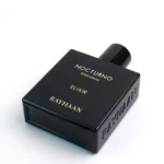 Luxury dark masculine perfume Rayhaan Nocturno Elixir 100ml on a plain background