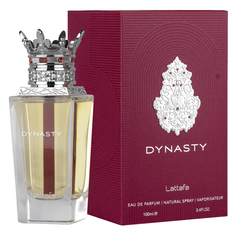 Lattafa Dynasty perfume with minimal ginger root and raspberry placed strictly behind the bottle.