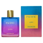 Rayhaan Pacific Aloha perfume with minimal watermelon slices and coconut placed strictly behind the bottle.