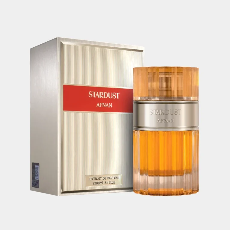 Afnan Stardust perfume with minimal mandarin slices and cinnamon sticks artistically arranged exclusively on the left and right sides of the bottle.