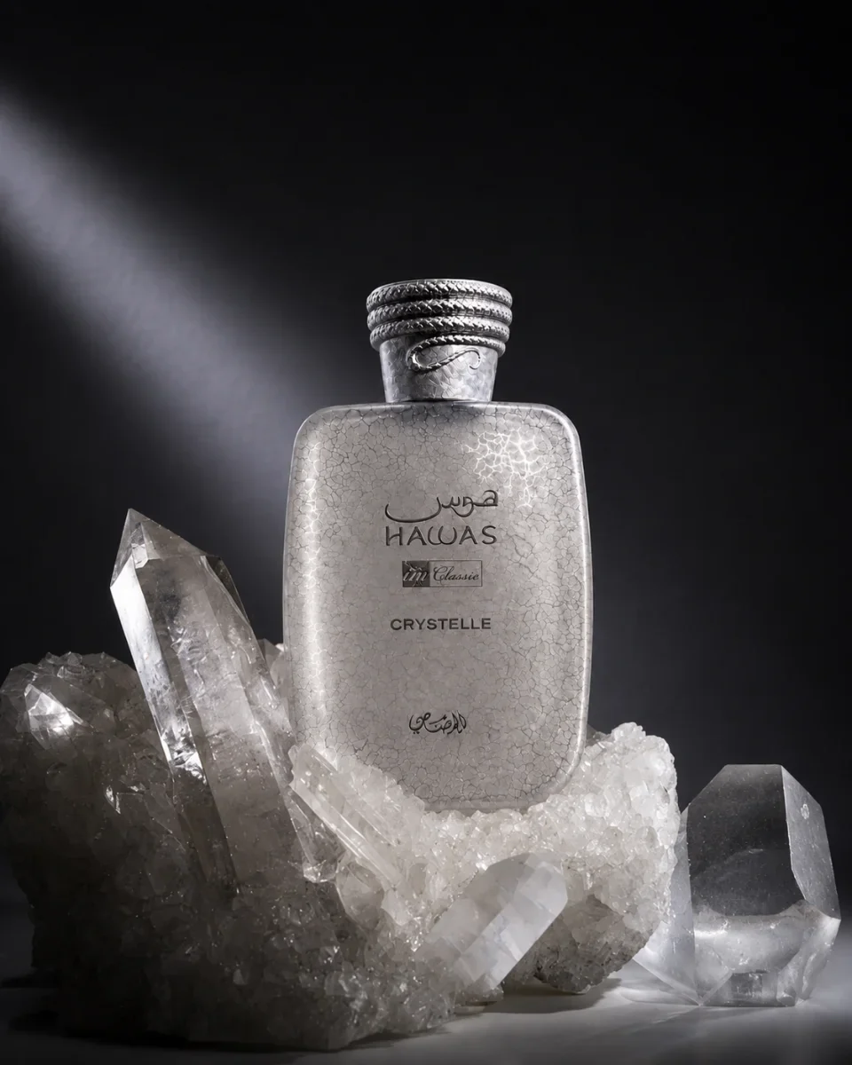 crystelle 1 Rasasi Hawas Crystelle 100ml bottle centered on a pristine clean background with no stand.