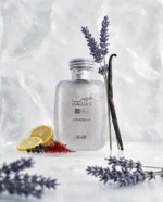 Close-up of Hawas Crystelle bottle with subtle jasmine flowers and cedarwood positioned strictly on the left and right sides of the glass.