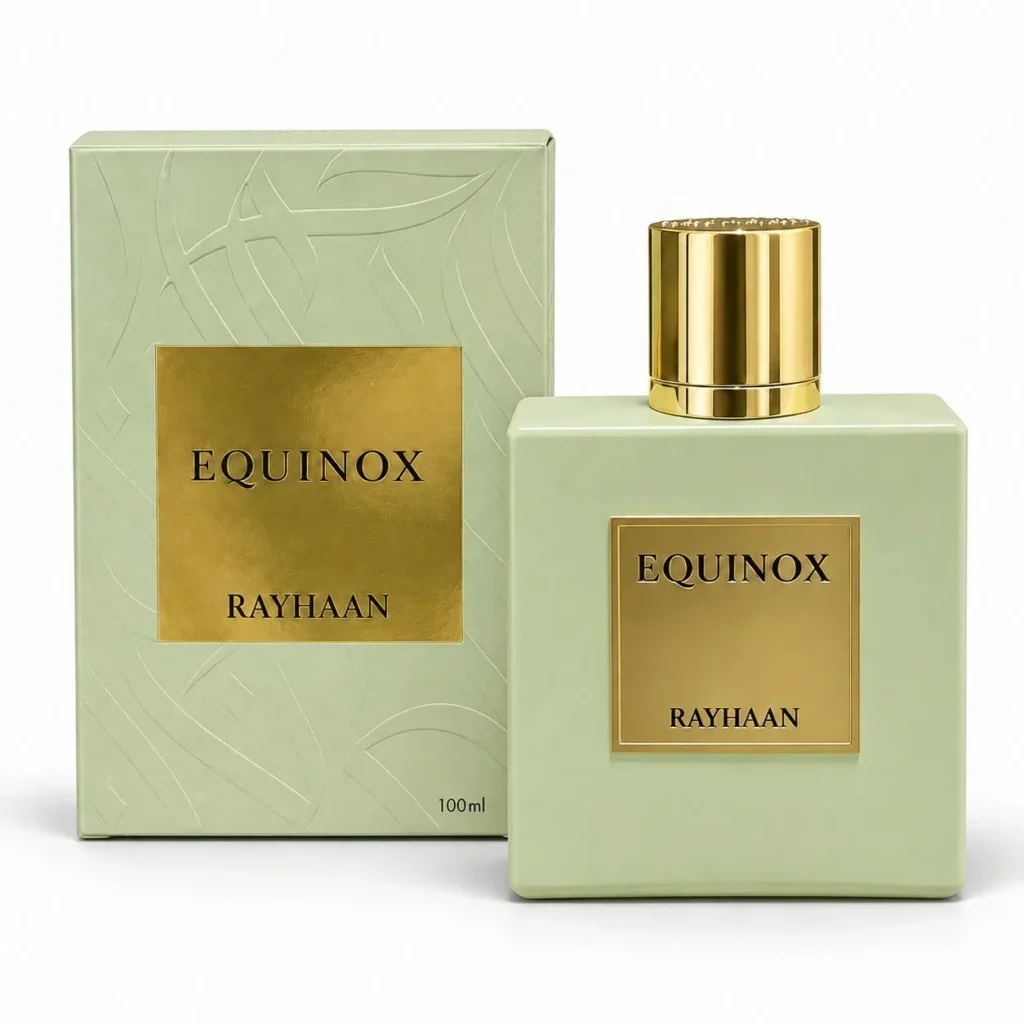 Rayhaan Equinox perfume with minimal grapefruit slices and orange blossoms artistically arranged exclusively on the left and right sides of the bottle.